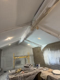 Room stripped to insulation before drywall